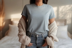 Woman wearing blue t shirt and jeans image Product Image 1