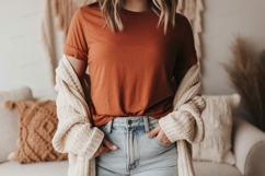 Woman wearing burnt orange t shirt and cream cardigan Product Image 1