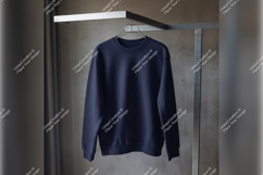 Navy Blue Sweatshirt Mockup Hanging On Rack Product Image 1