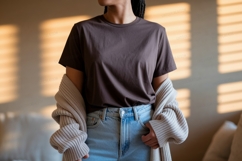 Woman wearing brown t shirt and blue jeans image Product Image 1