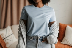 Woman wearing light blue t shirt and grey cardigan Product Image 1