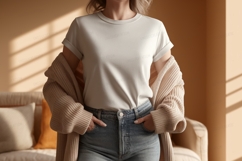 Woman wearing light t shirt and cardigan jeans Product Image 1