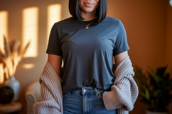 Woman wearing dark grey t shirt and denim jeans image Product Image 1
