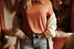 Woman wearing orange t shirt and denim jeans t-shirt Product Image 1
