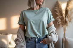 Woman wearing a green t shirt and jeans t-shirt casual Product Image 1