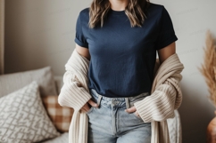 Woman wearing navy t shirt and cream cardigan image Product Image 1