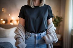 Woman wearing black t shirt and jeans image Product Image 1