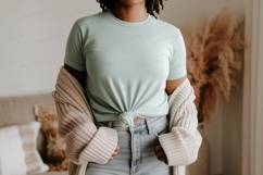 Woman wearing mint t shirt and beige cardigan image Product Image 1