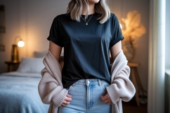 Woman wearing dark t shirt and light cardigan t-shirt Product Image 1