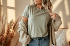 Woman wearing green t shirt and beige cardigan image Product Image 1