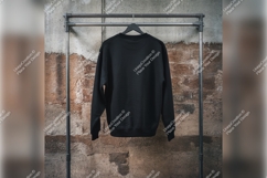 Black Tshirt Mockup On Rack Back View Product Image 1