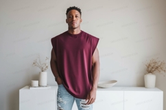 Man wearing maroon sleeveless shirt ripped jeans image Product Image 1