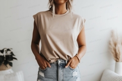 Woman wearing tan shirt denim shorts image Product Image 1