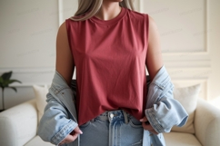Woman wearing denim jacket and red tank top image Product Image 1