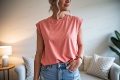 Woman wearing coral t shirt and denim shorts image Product Image 1