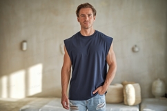 Muscular man wearing sleeveless shirt blue denim Product Image 1