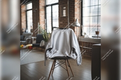 Gray Tshirt Mockup On Chair Indoors Product Image 1