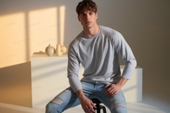 Young man wearing casual clothing grey shirt Product Image 1