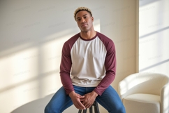 Man wearing baseball shirt and jeans maroon Product Image 1