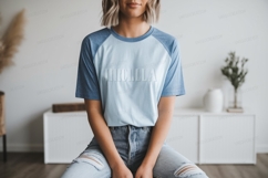 Blue raglan shirt with embossed text light Product Image 1
