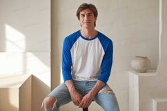 Young man wearing blue white baseball shirt Product Image 1