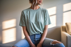 Woman wearing green t shirt and ripped jeans image Product Image 1
