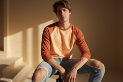 Young man orange shirt ripped jeans male peach Product Image 1