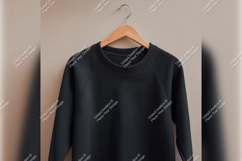 Black Sweatshirt On Hanger Tshirt Mockup Template Product Image 1