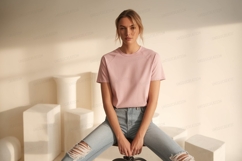 Pink shirt ripped jeans woman image Product Image 1