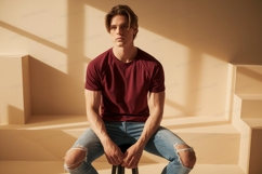 Young man maroon shirt denim jeans image Product Image 1