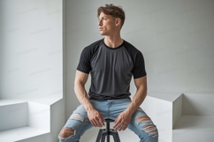 Man wearing dark gray t shirt light blue jeans casual Product Image 1