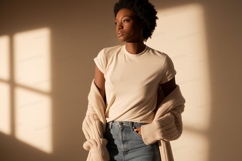 Woman wearing cream t shirt and cardigan image Product Image 1