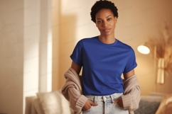 Woman wearing blue t shirt and cardigan image Product Image 1