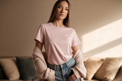 Woman wearing pink t shirt and cardigan image Product Image 1