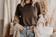 Woman wearing brown shirt and cardigan jeans Product Image 1