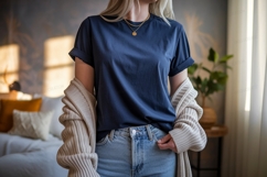 Woman wearing navy t shirt and jeans image Product Image 1