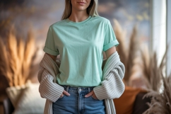 Woman wearing mint t shirt and cardigan image Product Image 1