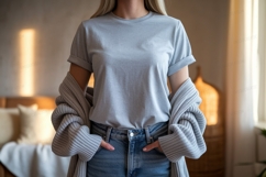 Woman wearing grey t shirt and jeans image Product Image 1