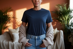 Woman wearing navy t shirt and jeans image Product Image 1
