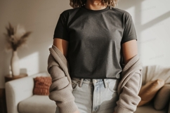 Woman wearing dark grey t shirt and light blu Product Image 1