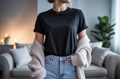 Woman wearing black t shirt and jeans image Product Image 1