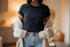 Woman wearing black t shirt and jeans image Product Image 1