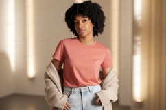 Woman wearing coral t shirt and cardigan Product Image 1