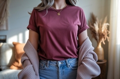 Woman wearing maroon t shirt and jeans image Product Image 1