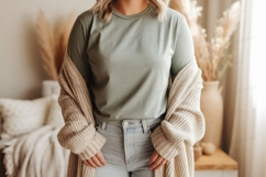 Woman wearing green t shirt and beige cardigan image Product Image 1