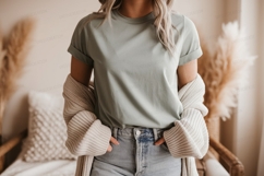 Woman wearing green t shirt and beige cardigan image Product Image 1