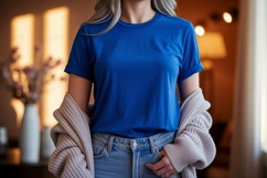 Woman wearing blue shirt and cardigan jeans Product Image 1
