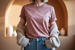 Woman wearing pink t shirt and jeans image Product Image 1
