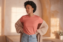 Woman wearing coral t shirt and cardigan Product Image 1
