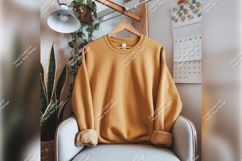 Mustard Sweatshirt On Chair Tshirt Mockup Product Image 1